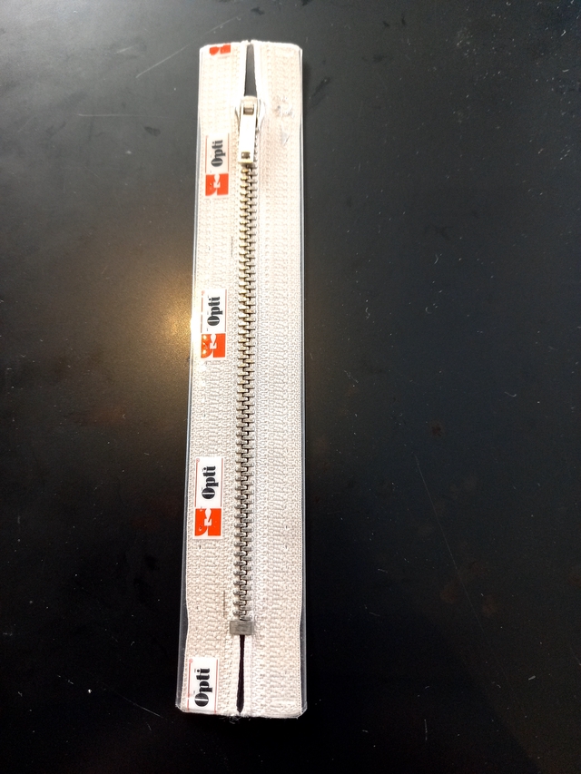 M40 / kleur 849 Opti Rits metaal (zilver) 