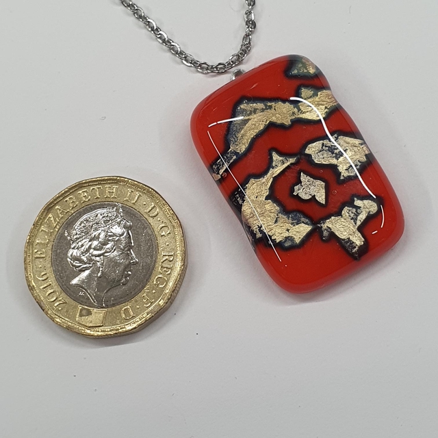 Orange and silver mountain pattern pendant NEW