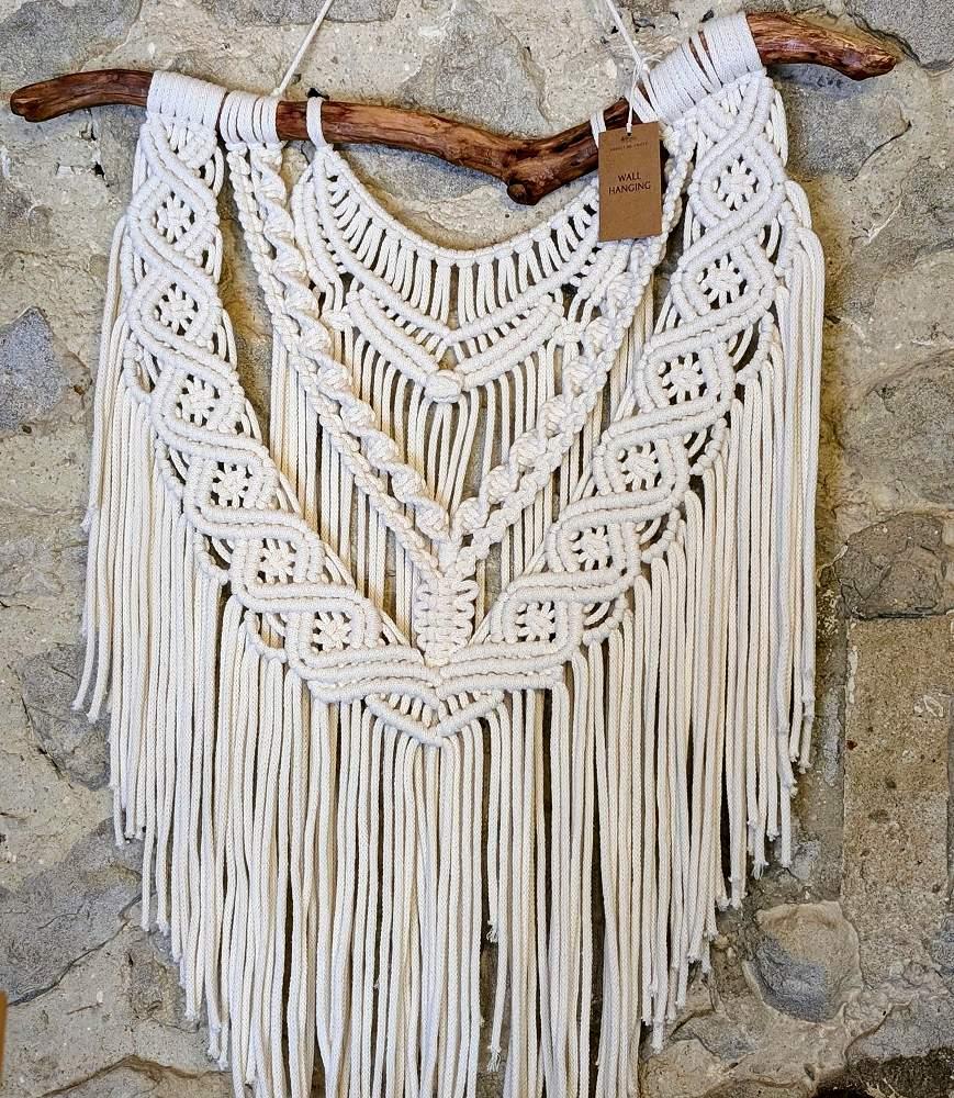 Handmade macramé wall hanging by Forget Me Knots Macrame, crafted with recycled cotton rope, featuring detailed diamond knots and fringe. Boho wall décor for modern interiors.