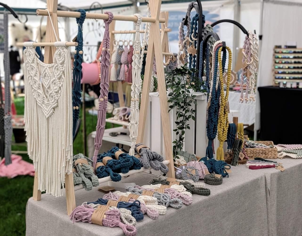 Handmade macramé stall display at craft market by Forget Me Knots