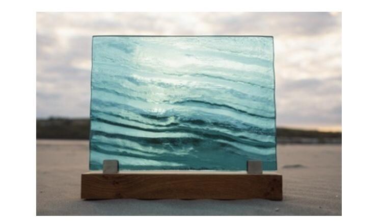 pressed by the ocean waves into classic glass casts 