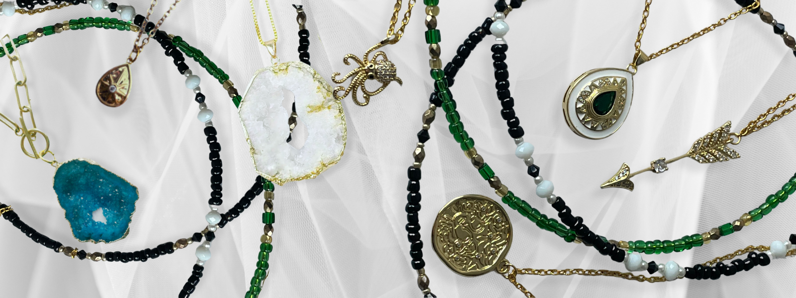 Beaded necklaces, chains with metal pendant charms in unique designs
