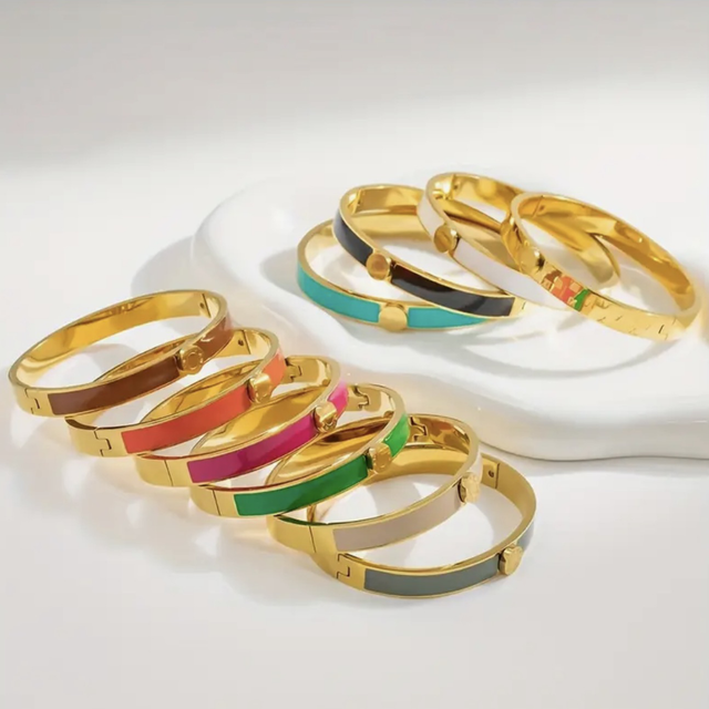Statement cuff bracelets and charm bracelets in bold, stylish designs