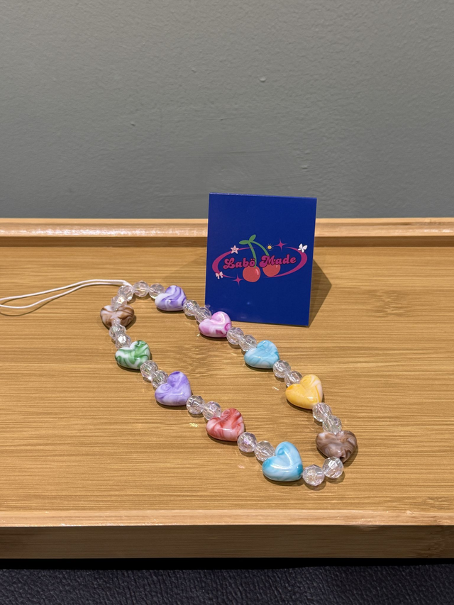 Cute charm strap with mixed acrylic beads and mini fruit shapes, perfect for summer vibes.