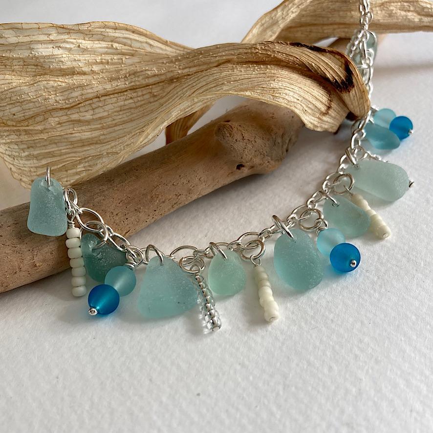 I’m a self-taught silversmith creating organic, sea-inspired jewellery. I work with sterling silver, copper, sea glass, and various semi-precious stones, crafting unique pieces that reflect the beauty of the ocean. Every piece of
sea glass I use is hand-collected along the Kent coastline, making each design truly one of a kind. I also love taking on commissions, so if you have a special idea in mind, I’d love to bring it to life.