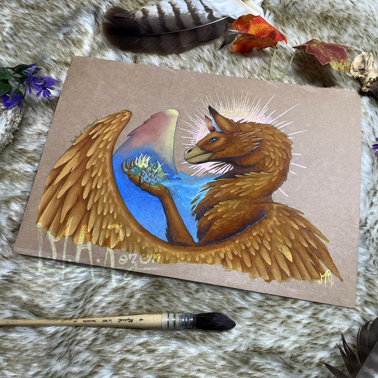 Photo d'une aquarelle d'un griffon aux plumes de cuivre tenant dans ses pattes des œufs.