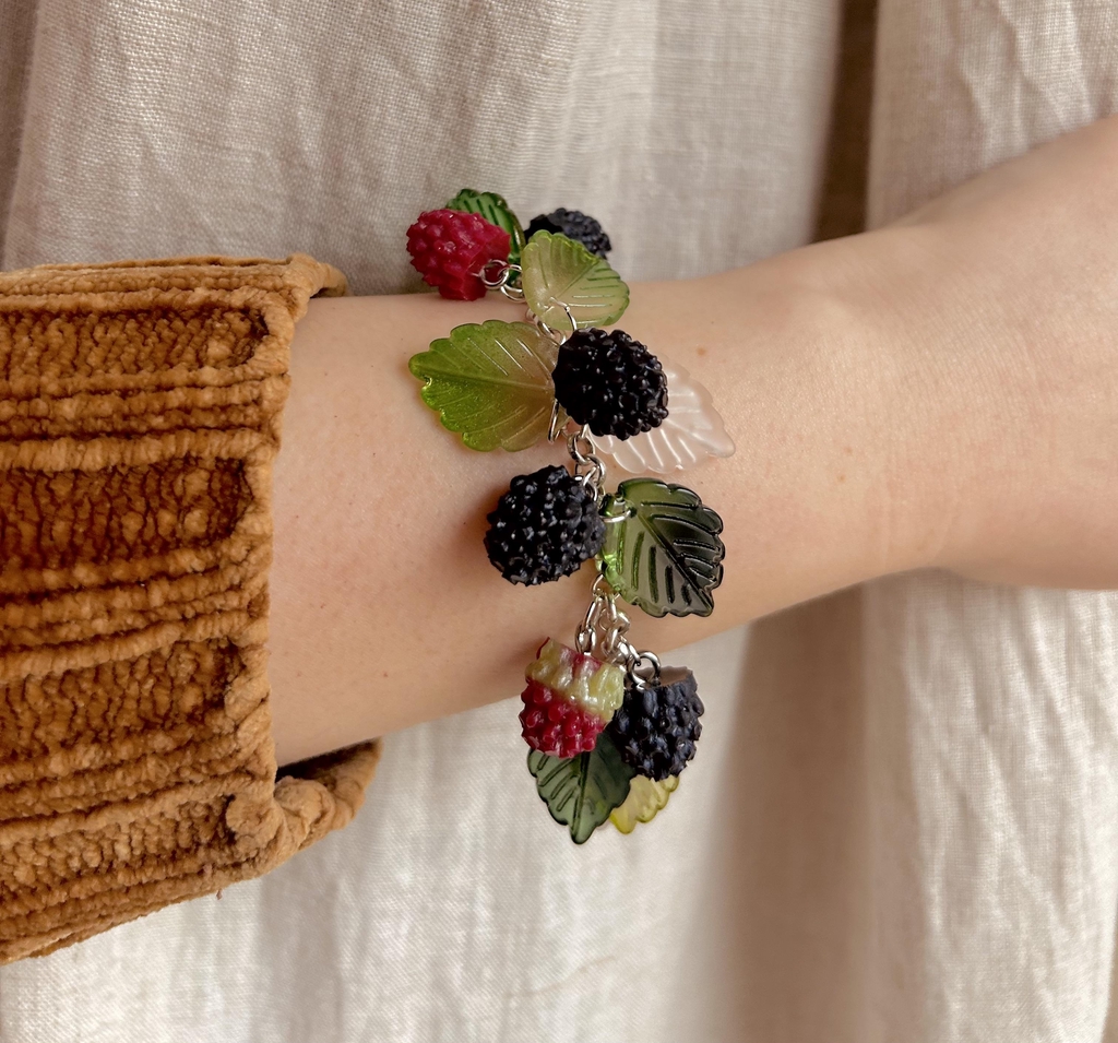 Photo of a BlackBerry bracelet with resin blackberries and glass leaves
