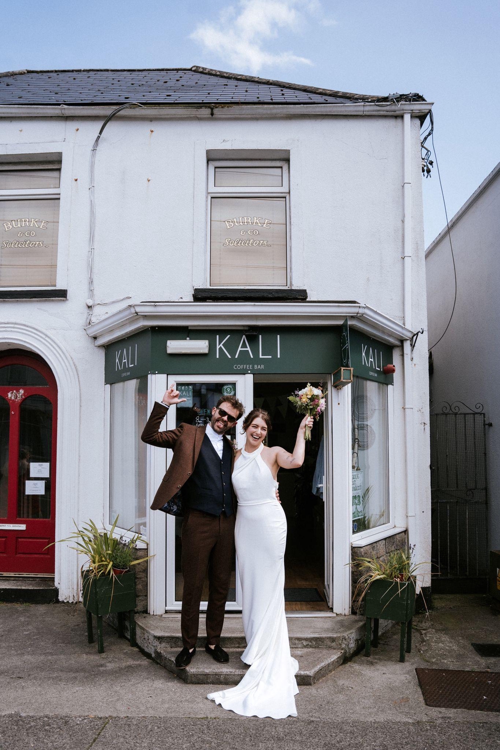 Who are Kali Coffee Bar?
A photo of owners, Enda and Laura, on their wedding day outside of Kali.