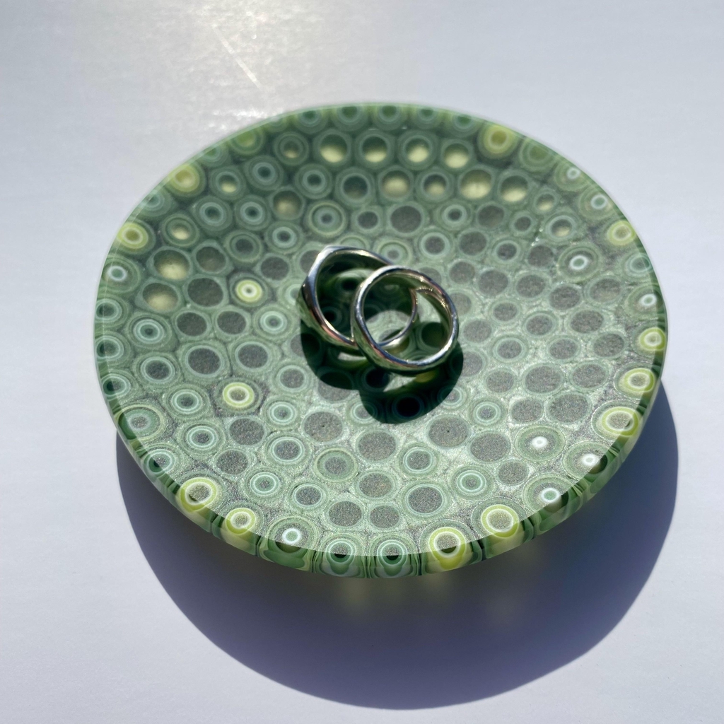 Green glass ring dish made of individual fused murrine