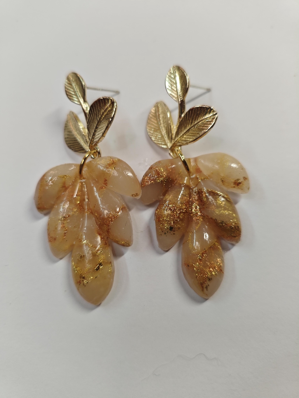 Pendientes en arcilla polimérica y velas 100% de soja.