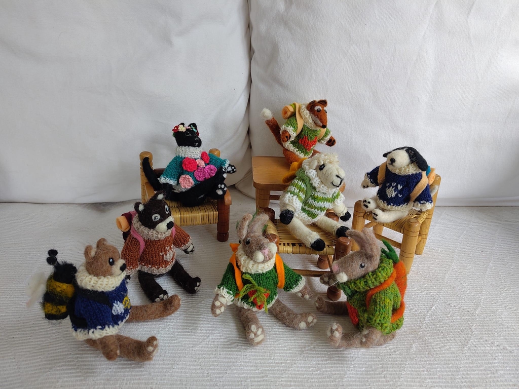 Handmade jointed needle felt characters with hand knitted Shetland jumpers for all life's journeys. 