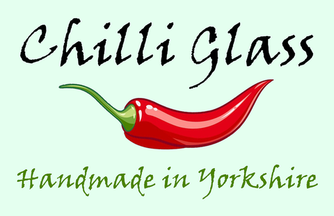 Chilli Glass logo of a red chilli with the text handmade in Yorkshire.