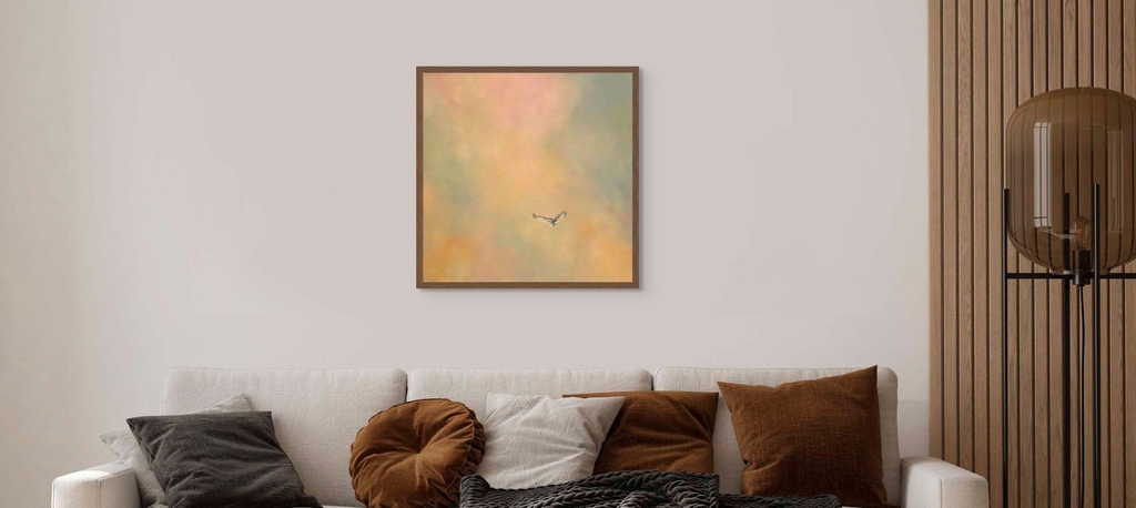 Original artwork “serenity” by Steph Cork hanging over a shelf with trendy household items placed on it