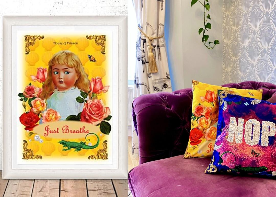 A collage of two images. First one a House of Frisson poster on the floor leaning against the wall. The yellow poster has an image of a doll surrounded by flowers and bugs, it reads "Just Breathe". The second image shows a sofa with two House of Frisson's cushion covers, one yellow and the other in electric blue.
