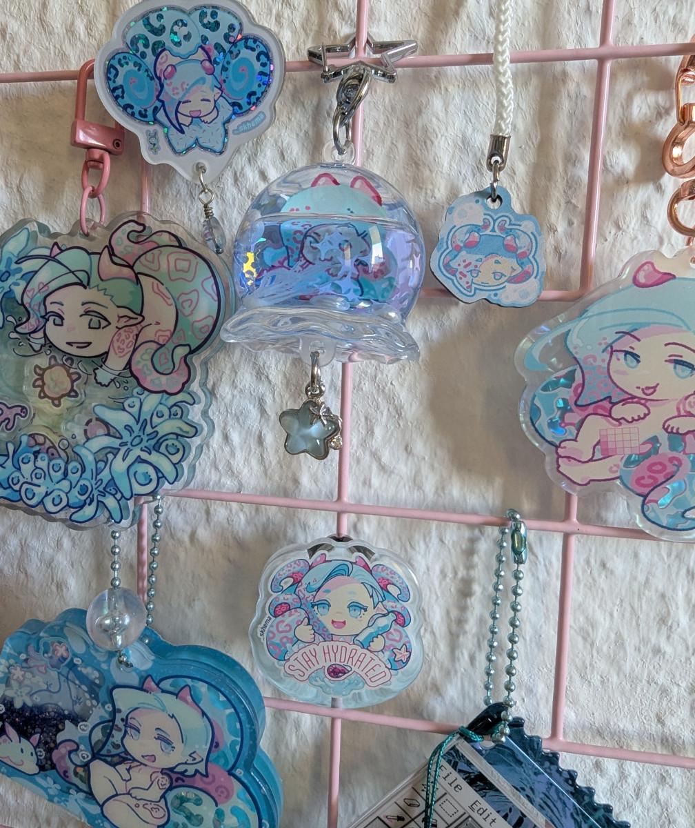 Acrylic charm keychains, most with fancy effects, depicting my original characters from my self-published BL / yaoi manga comic.