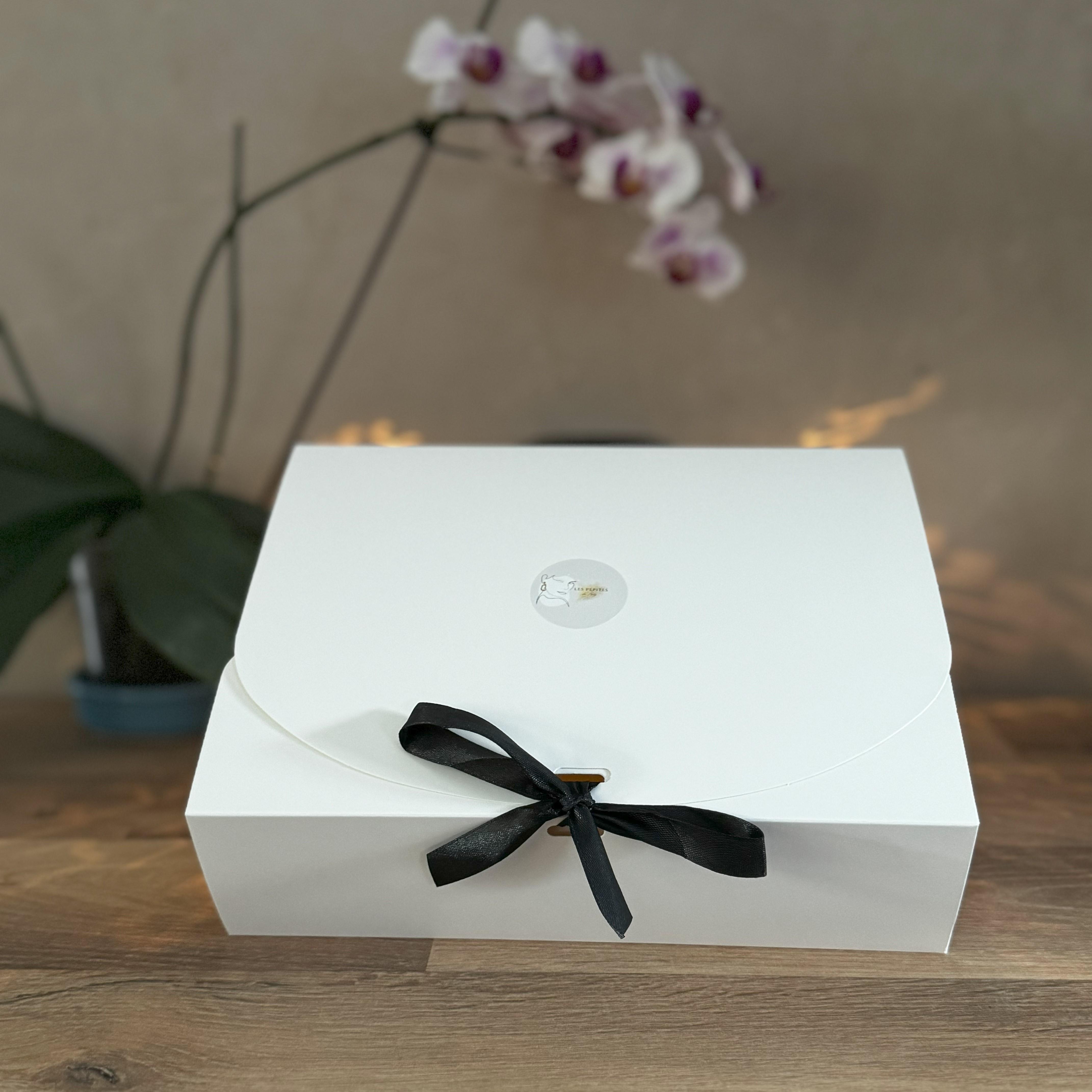 Besoin d'un petit présent à offrir ? Optez pour la boite cadeau à garnir selon vos envies et votre budget