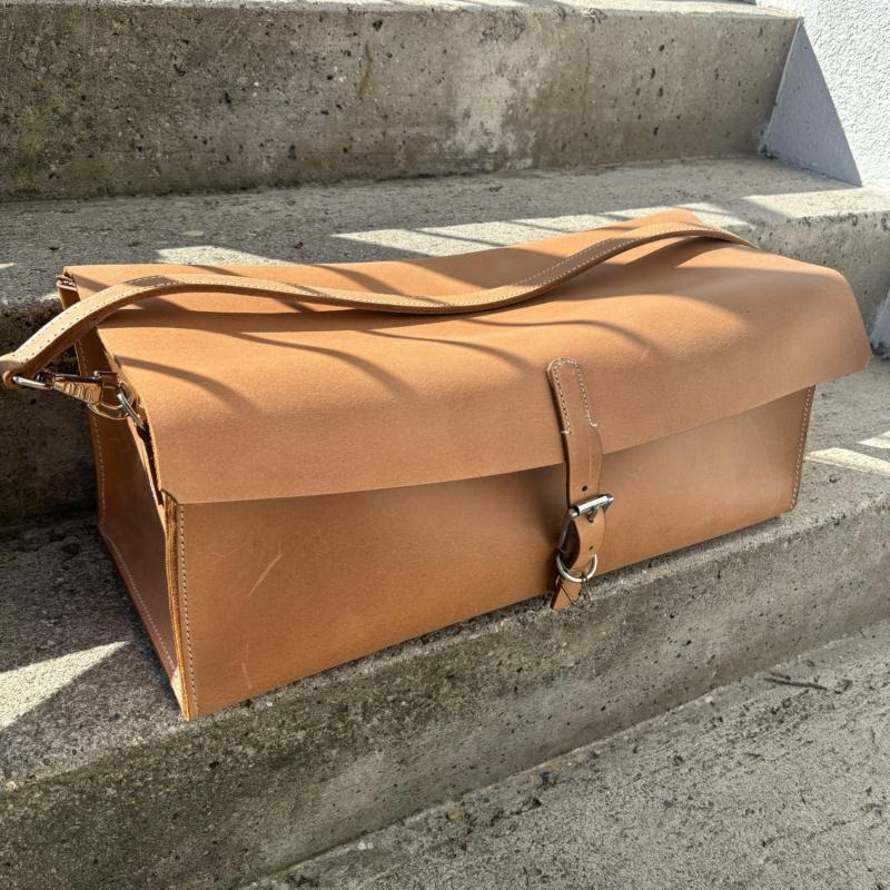 Schmiedetaschen und -schürzen