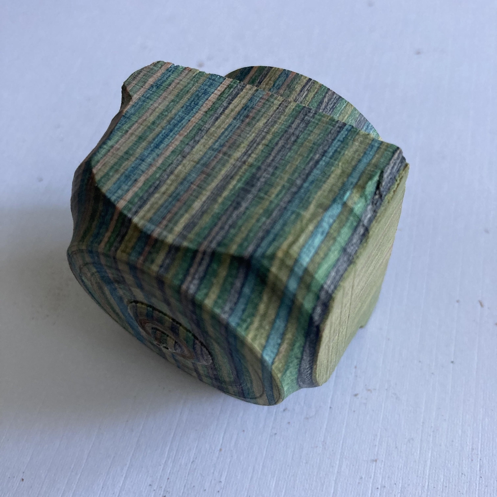 Stripy blue and green laminated wood cube