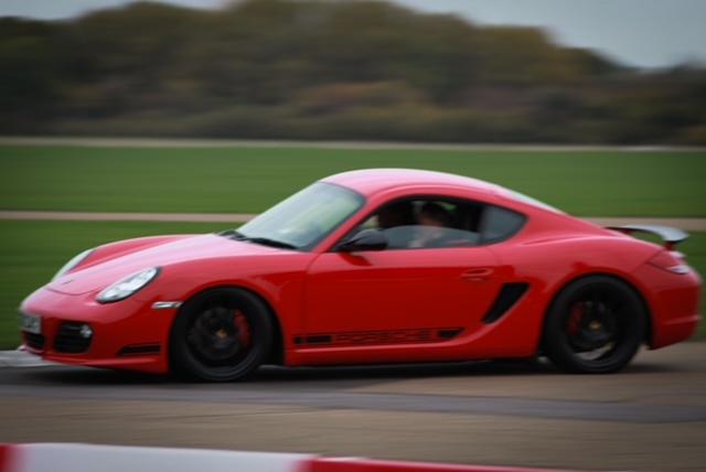Porsche Cayman R in Guards Red. On Track