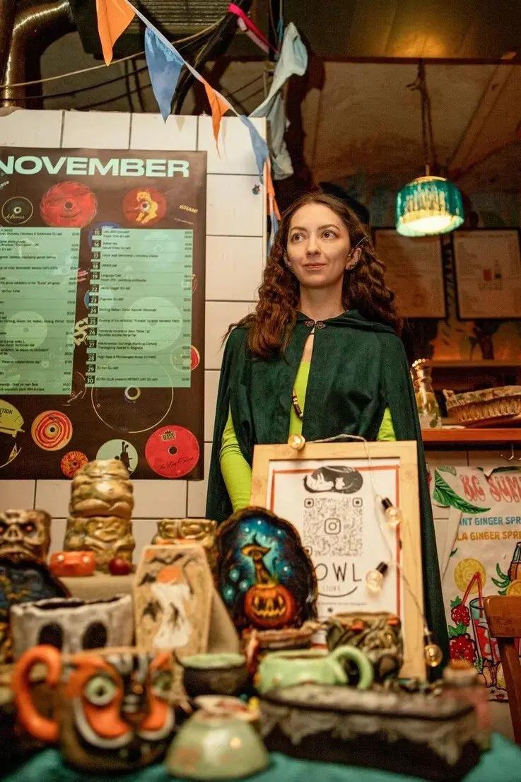 Sofia, the ceramic artist behind COWL, at her handmade ceramics stall