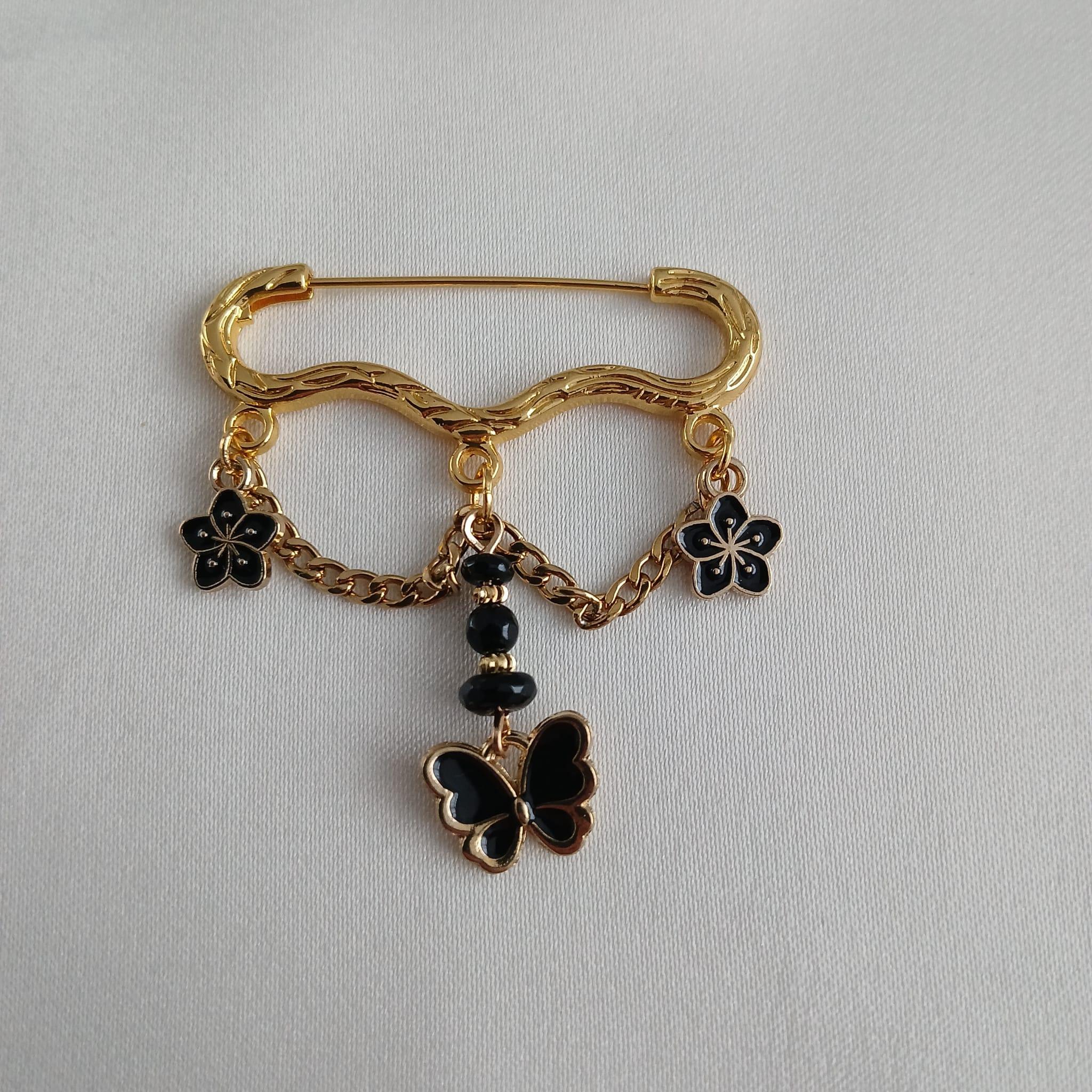 Broches met edelstenen