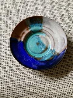 A large colourful ceramic vessel by Charlotte Gower