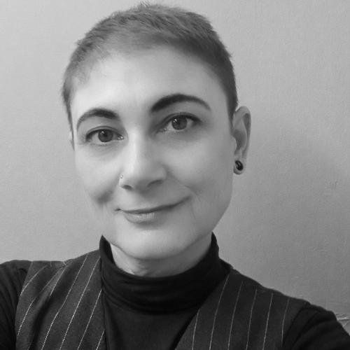 A black and white portrait of Elena.