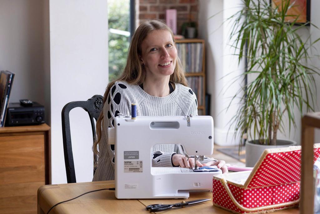 Picture of Elise, The Jolly Upcycler at her sewing table
