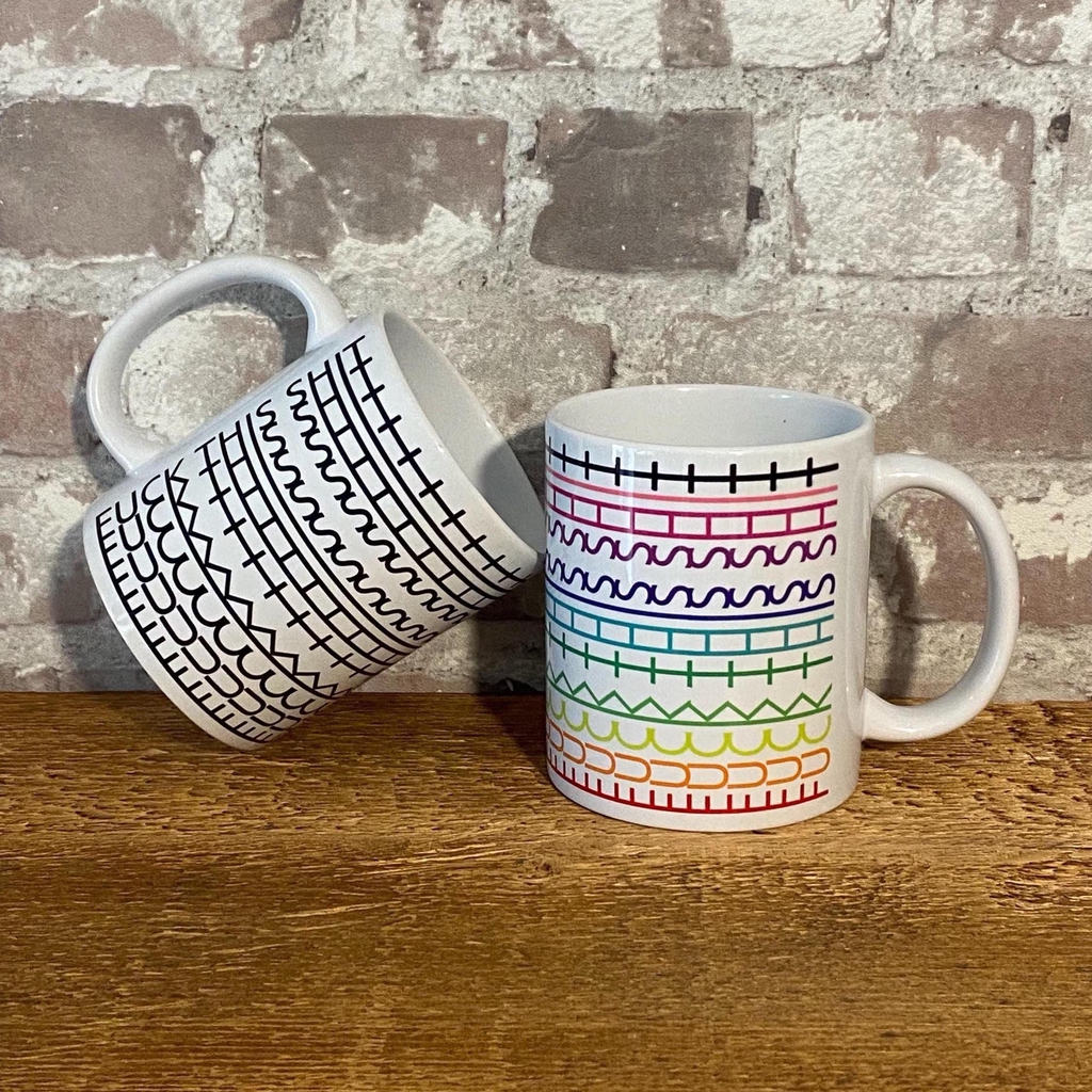 Hidden message mugs qiht patterned design revealing a cheeky message when turned sideways