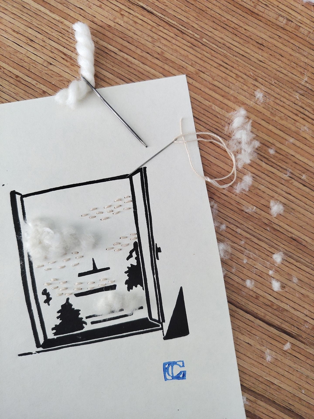 Linogravure brodée à la laine et au fil de coton mercerisé, représentant la vue depuis une fenêtre. 