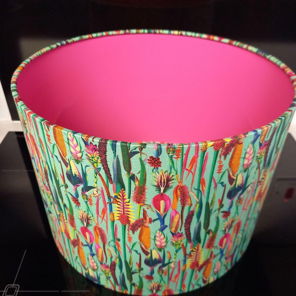 Image of lampshade with tropical plants and pink liner
