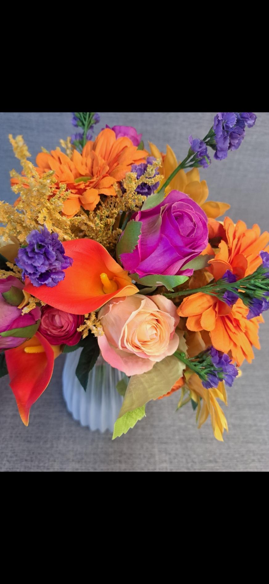 Bespoke artificial flower arrangement with bright colours