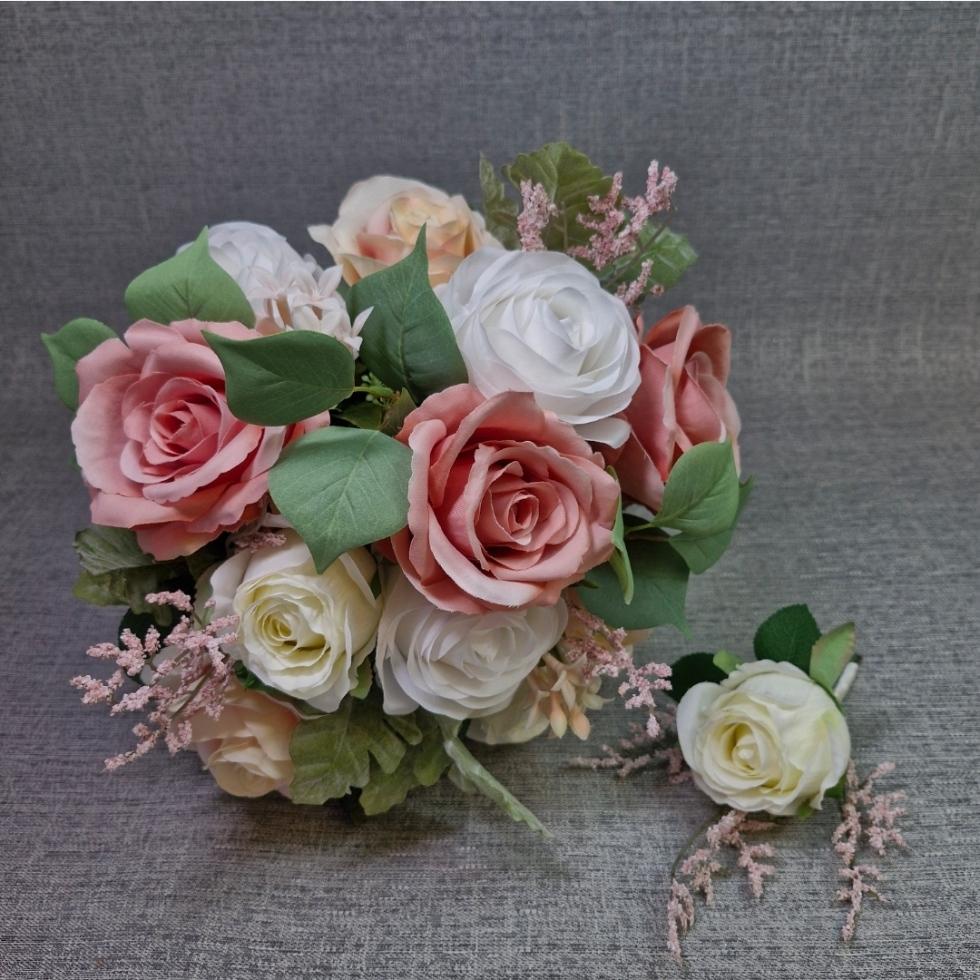 Wedding bouquet with pink and white roses