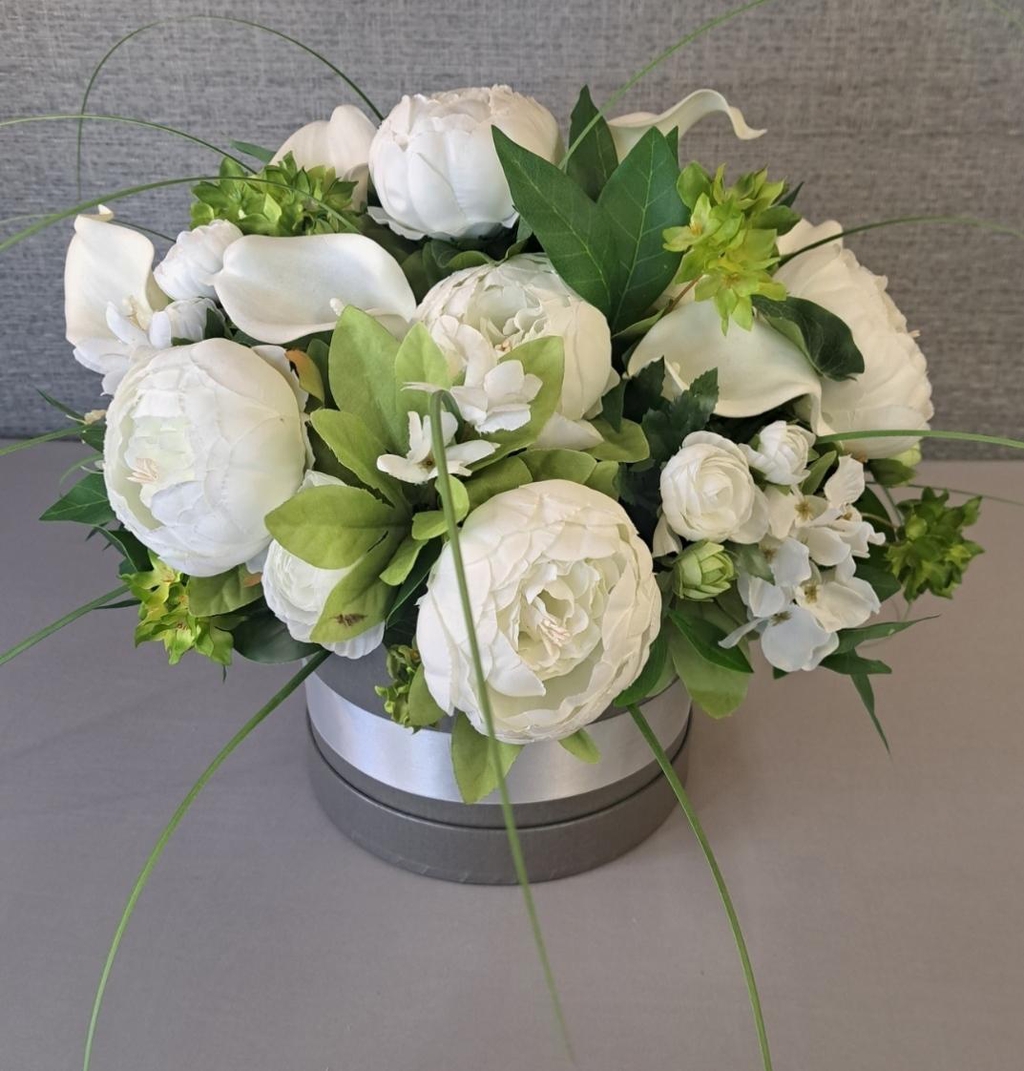 Artificial flower hatbox arrangement with white faux peonies, ranunculus, hydrangea and calla lillies