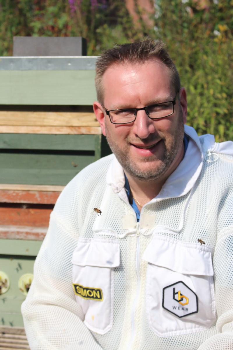 Simon in front of his bees