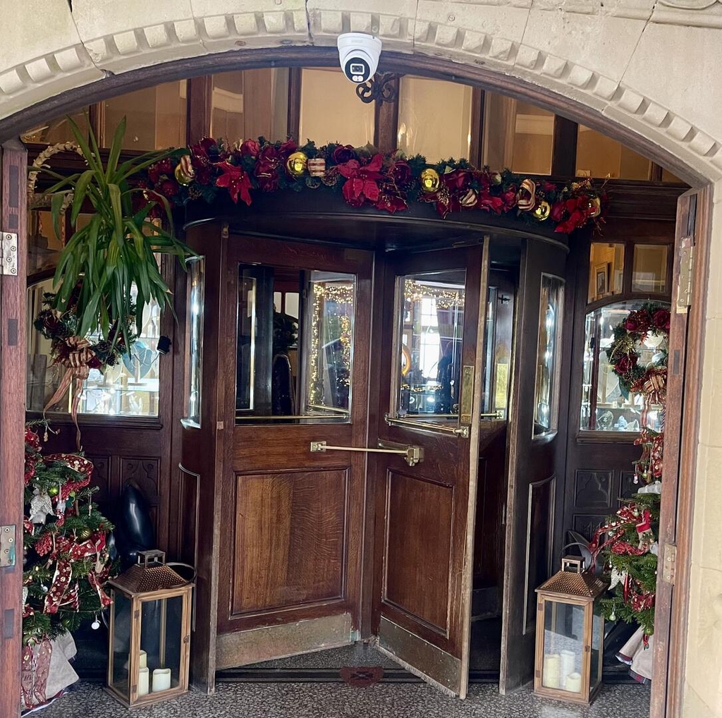 Here is am image of the entrance into The Camelot Castle Hotel in Cornwall with a Jemcom CCTV installed Serage Turret Camera monitoring staff and visitors