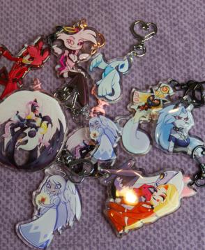 acrylic keychains of hazbin hotel, helluva boss, digimon, pokemon and more