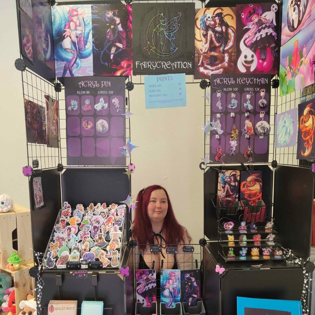 Artist Alley convention picture of me with my wares