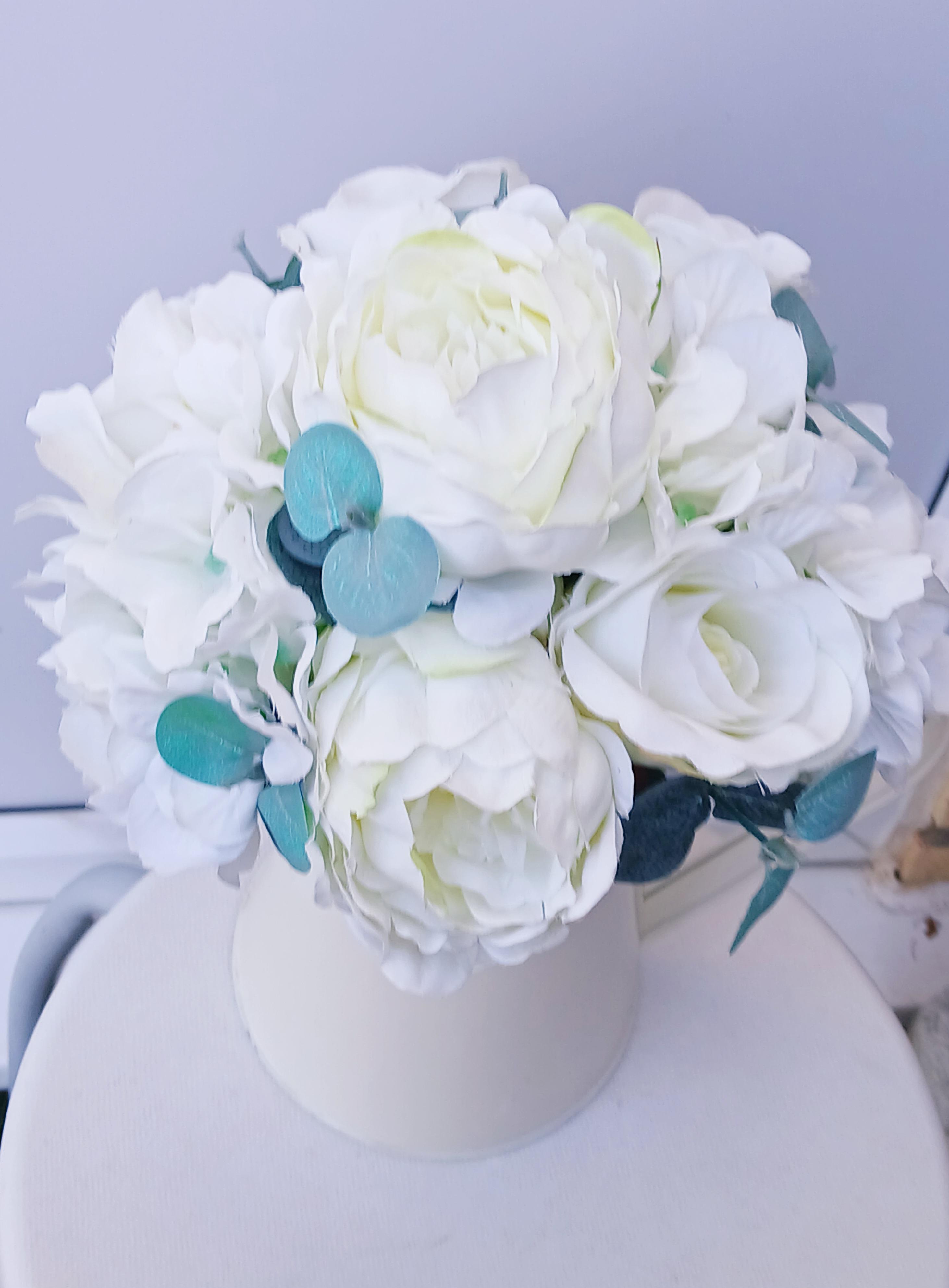 Artificial flower arrangements and bouquets for all occasions.