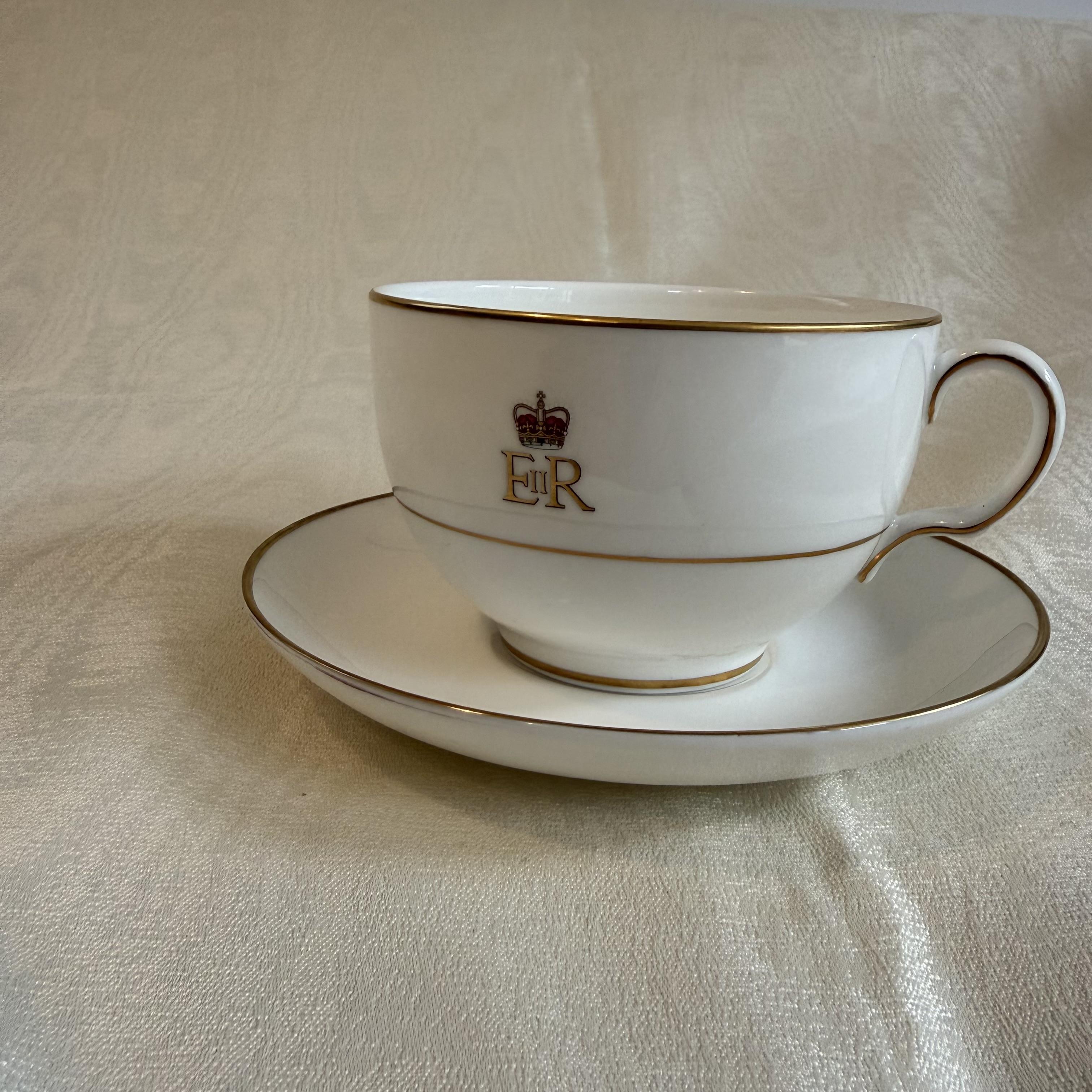 22 carat gold trimmed breakfast mug and saucer set with custom embossed cypher.