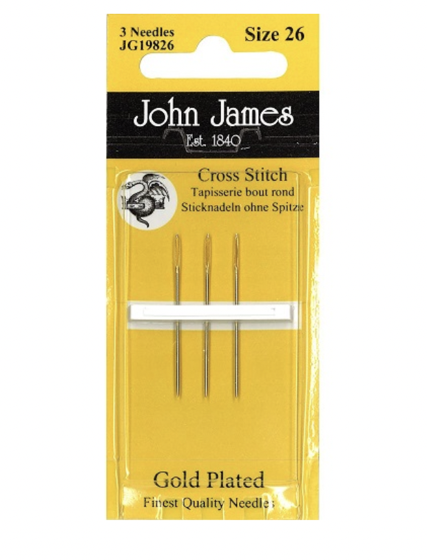 Cross stitch and tapestry needles in multiple packets and sizes.