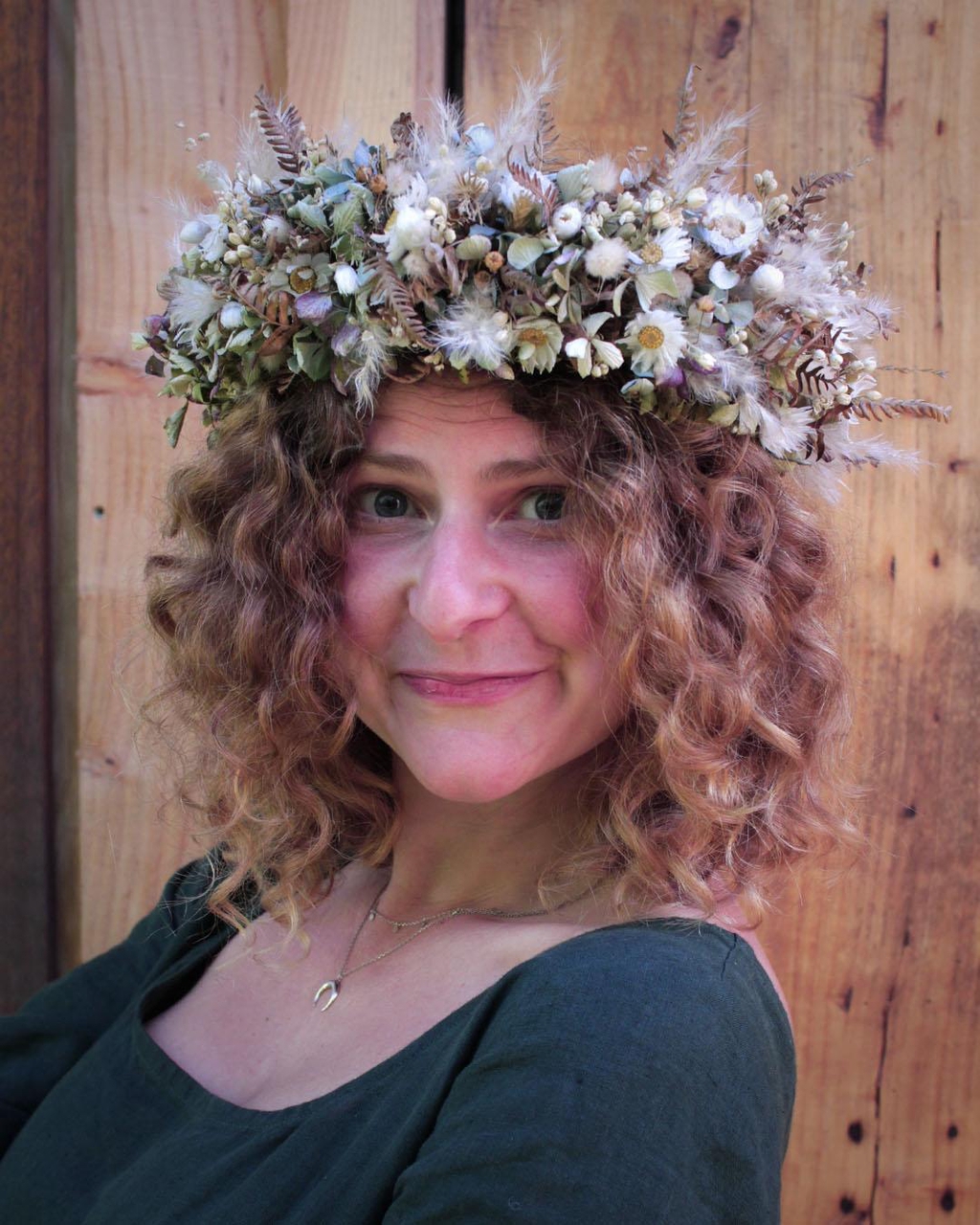 Emeline Rétif, founder of Explorium, sustainable wearing a dried flower crown.