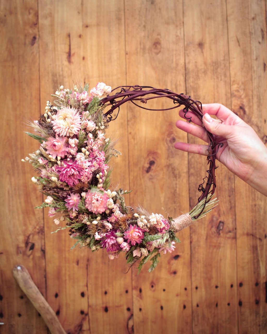 A sustainable dried flower crown, worn by Emeline Retif the founder of Explorium