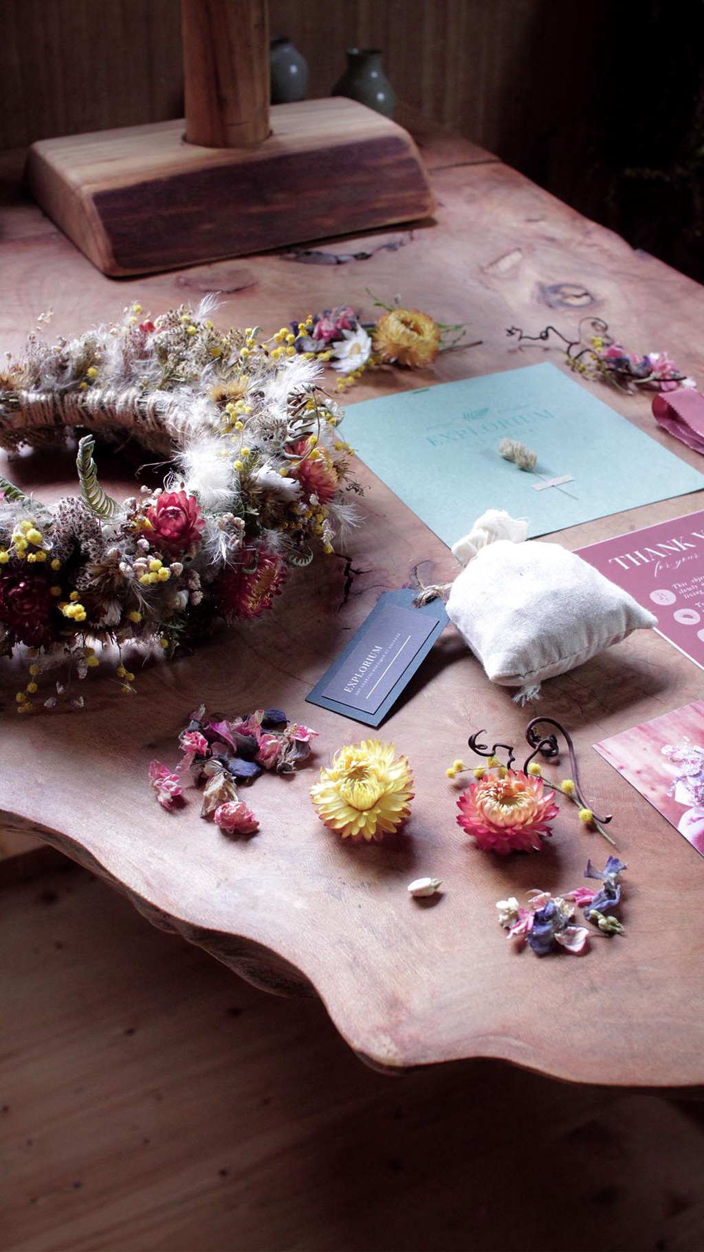 A sustainable dried flower crown, a bag of flower confetti