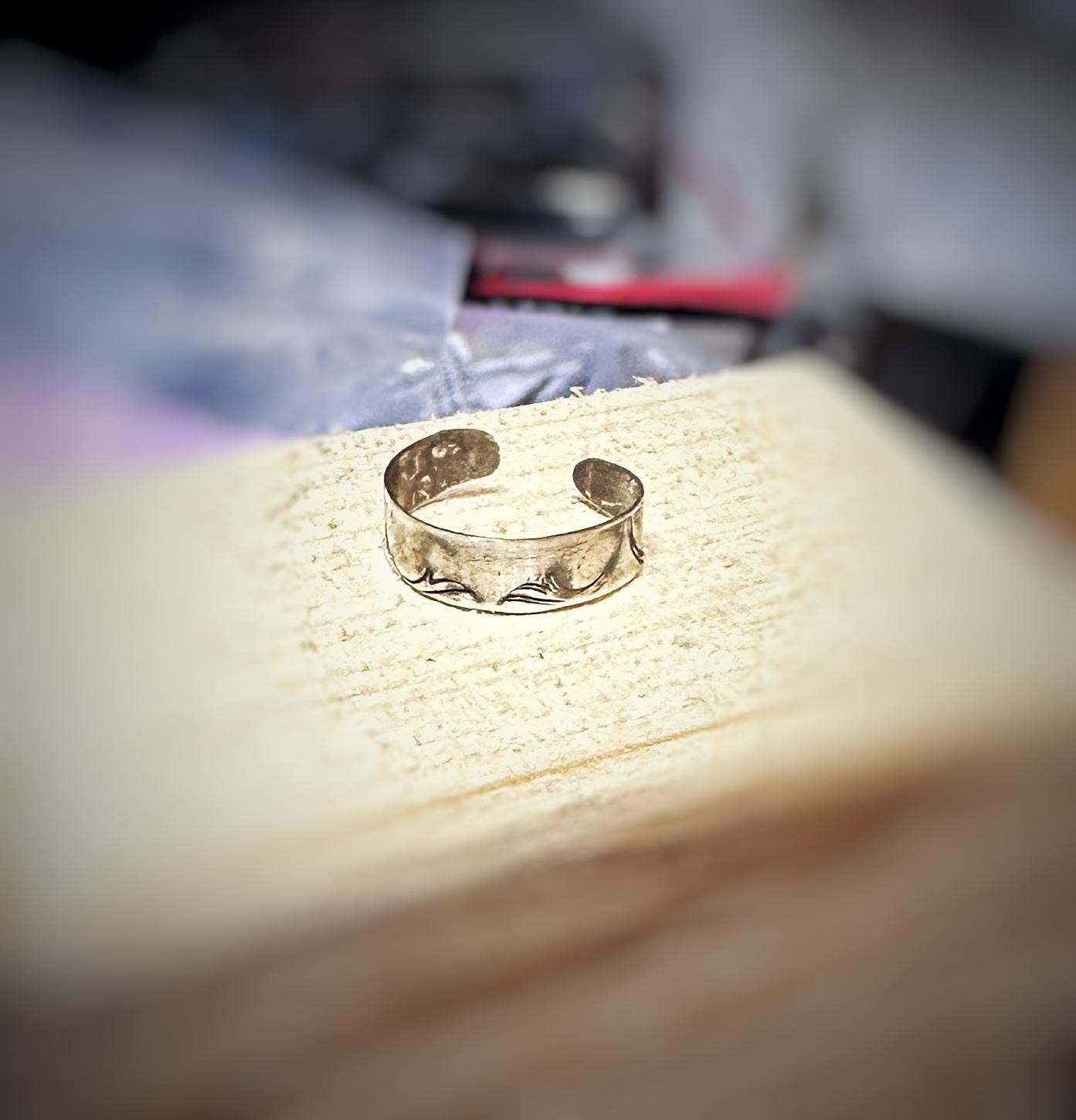 Simple open bands made of silver or copper or hand stamped cuffs in unique one off designs, browse for inspiration.