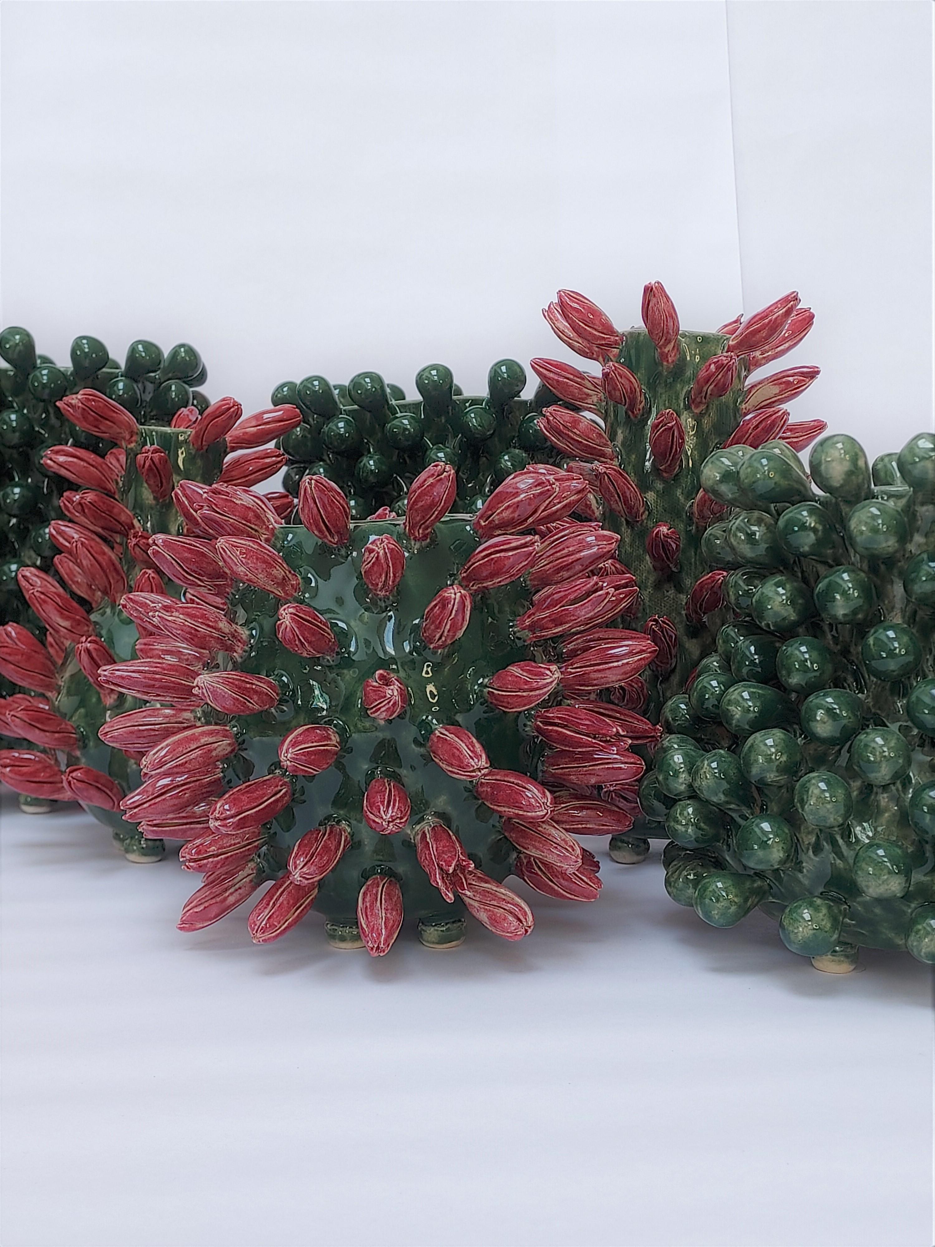 handbuild sculpted vases in stoneware clay