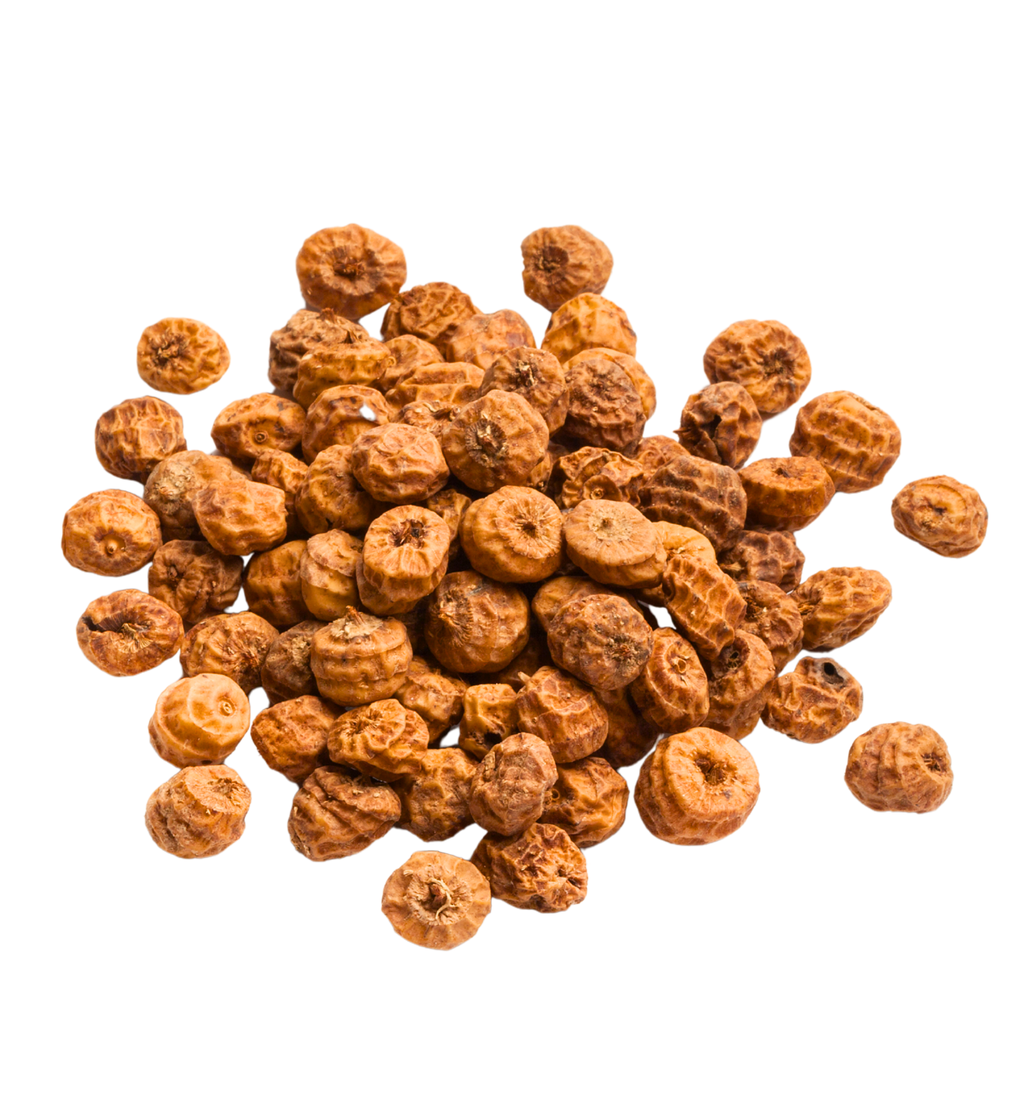 Souchet, également appelé noix tigrée ou tigernut dans des verres transparents.