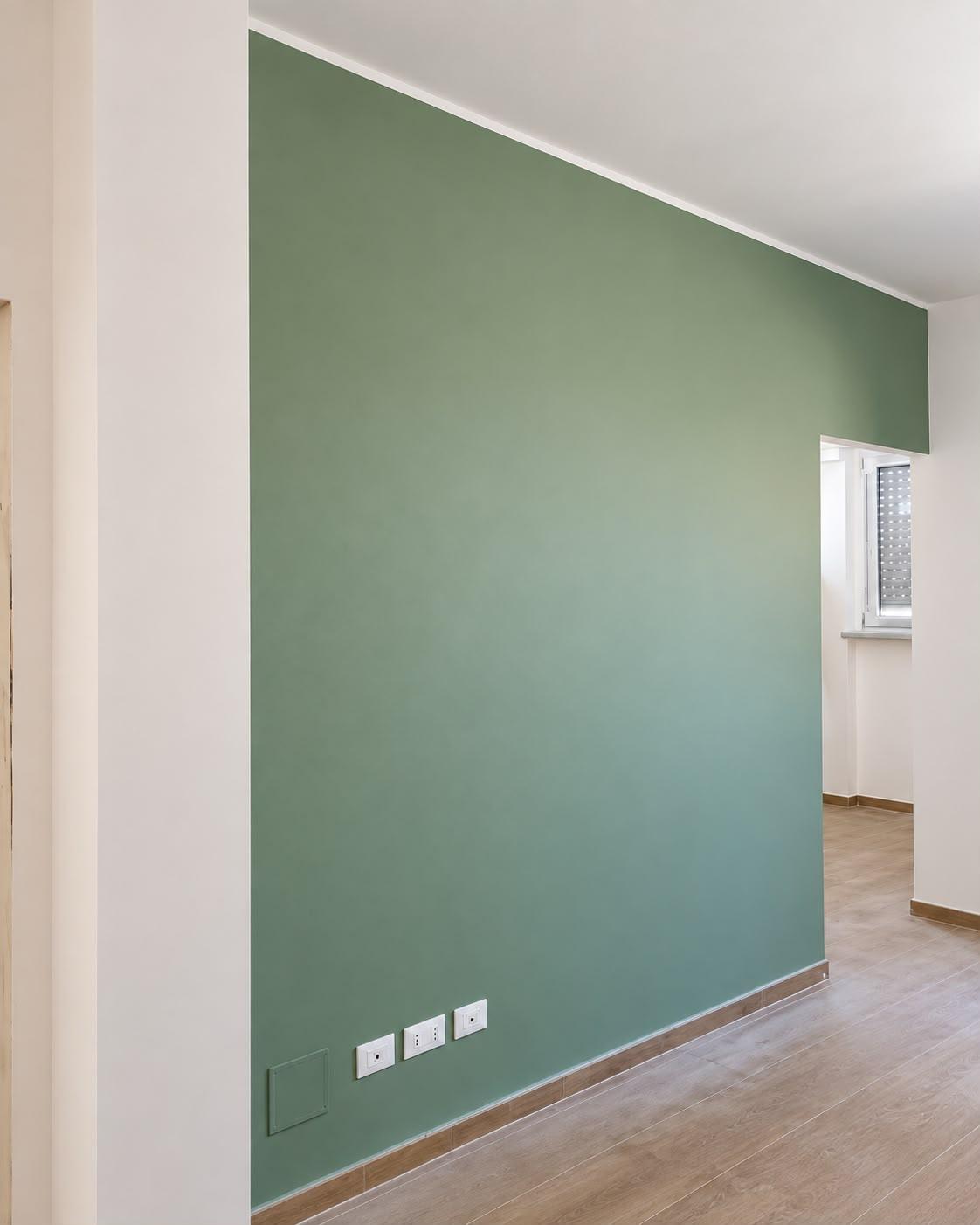 Parete decorativa verde realizzta da Pili Edilizia & Decorazioni
