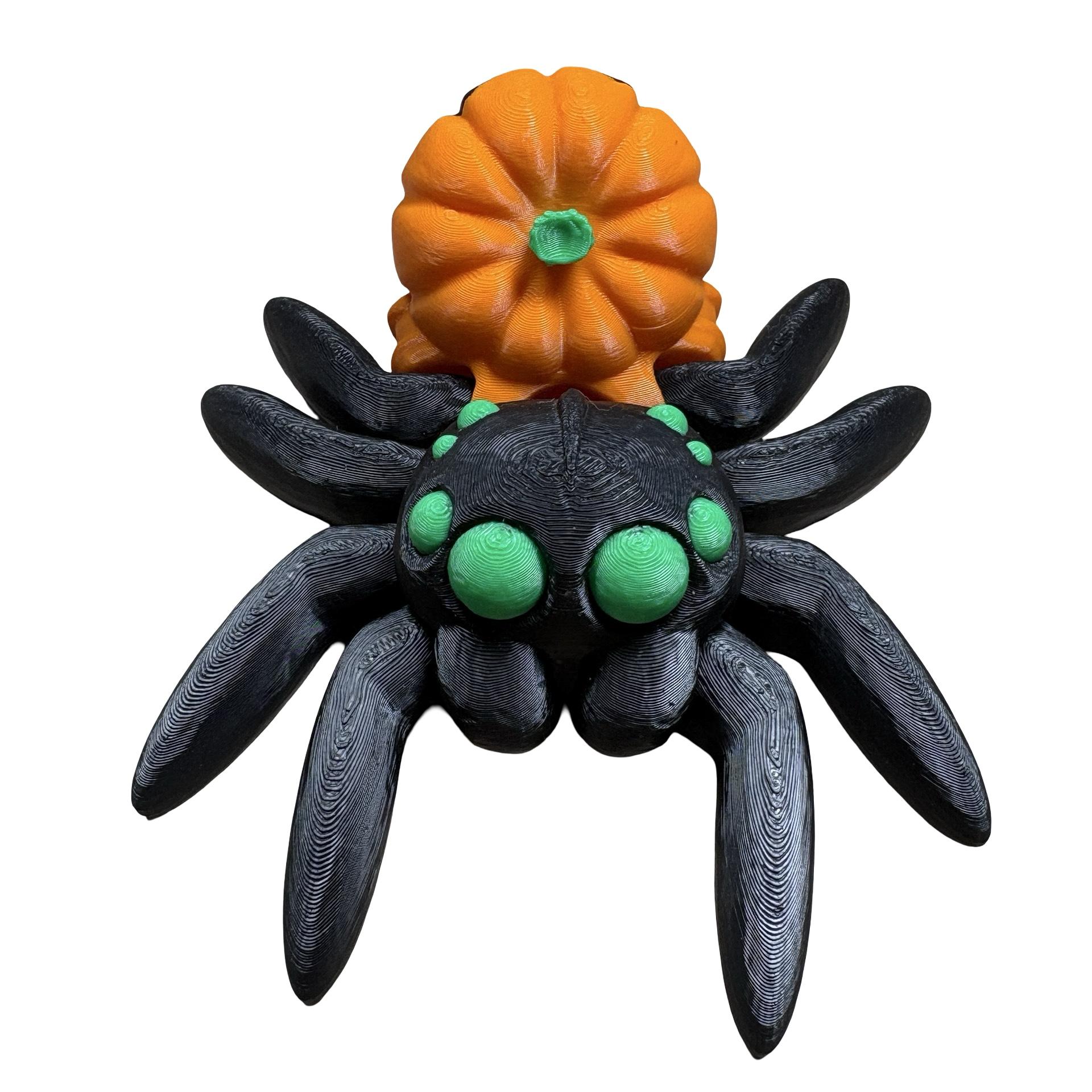Articulated 3D-printed pumpkin spider with a pumpkin abdomen, perfect for Halloween decorations and Spooky collection.