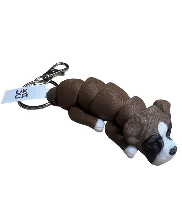 Articulated 3D printed dog, cat and animal keyrings, made in the UK.